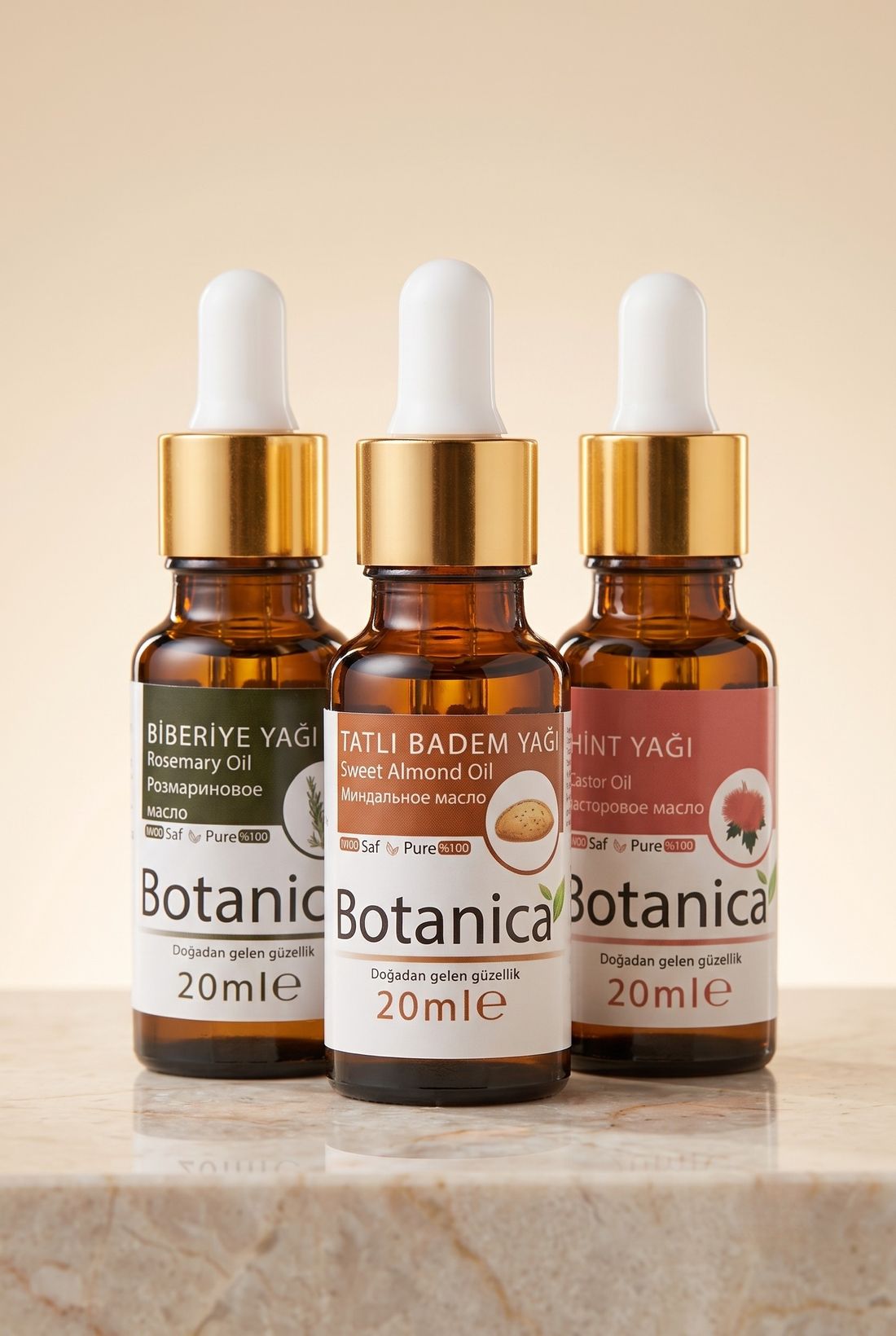Botanica biberiye, tatlı badem ve hint yağları amber cam şişelerde
